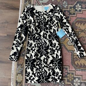 white long sleeve dress with black velvet florals